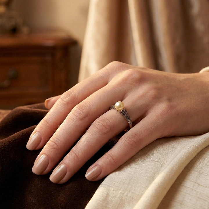 Elegant Pearl Ring with Gold Filigree Design