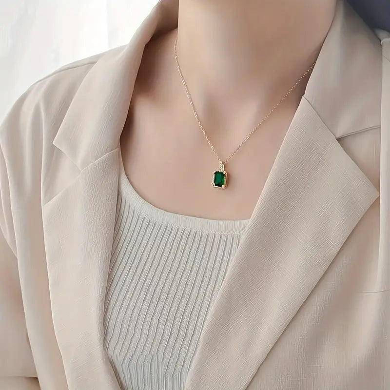 Emerald Halo Necklace with Gold Rectangular Design