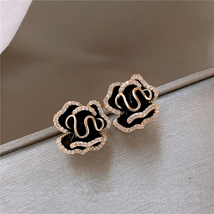 Sophisticated Gold Lotus Earrings in Black